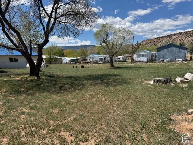 345 N 1st E, Manila, UT 84046 - view of green lawn featuring a mountain view