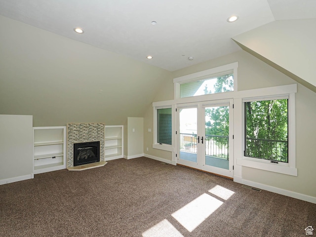 919 E 13800 S, Draper, UT 84020 - unfurnished living room featuring lofted ceiling, built in shelves, carpet floors, recessed lighting, and french doors