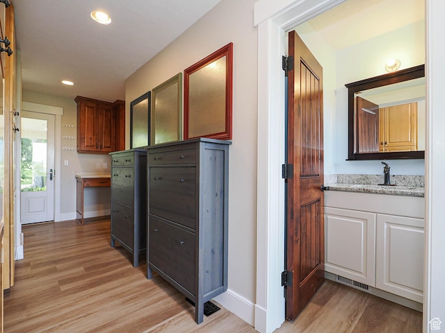 919 E 13800 S, Draper, UT 84020 - hall with light wood-style floors, baseboards, a sink, and recessed lighting