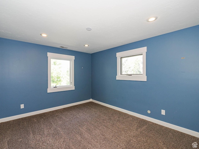 919 E 13800 S, Draper, UT 84020 - empty room featuring plenty of natural light, baseboards, carpet flooring, and recessed lighting