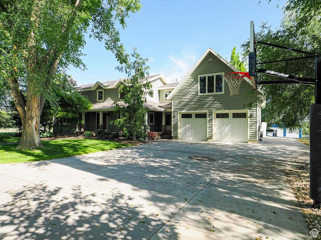 919 E 13800 S, Draper, UT 84020 - view of front of house featuring a garage, driveway, and a front lawn