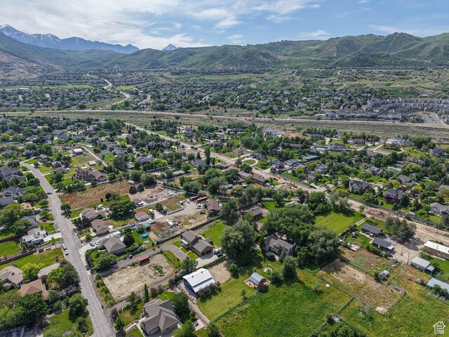 919 E 13800 S, Draper, UT 84020 - aerial view of property and surrounding area featuring a mountain backdrop and nearby suburban area