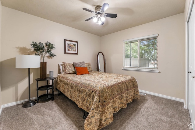 7198 S Milky Hollow Ln, West Jordan, UT 84084 - carpeted bedroom with baseboards and ceiling fan