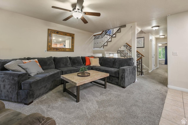 7198 S Milky Hollow Ln, West Jordan, UT 84084 - carpeted living room featuring a ceiling fan, stairway, tile patterned floors, and baseboards