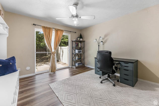 7198 S Milky Hollow Ln, West Jordan, UT 84084 - office area featuring ceiling fan, wood finished floors, and baseboards
