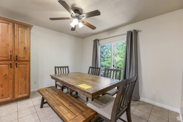 7198 S Milky Hollow Ln, West Jordan, UT 84084 - dining area featuring light tile patterned floors, ceiling fan, and baseboards