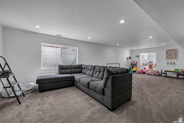 7217 N Hidden Steppe Bnd, Eagle Mountain, UT 84005 - carpeted living area featuring recessed lighting