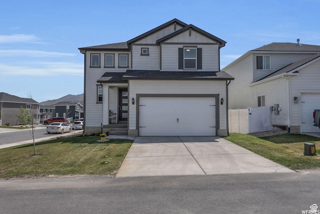 7217 N Hidden Steppe Bnd, Eagle Mountain, UT 84005 - view of front of home featuring driveway, a garage, a front yard, and board and batten siding