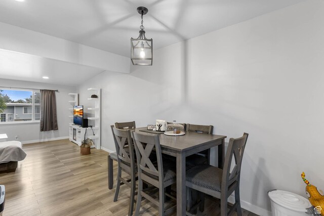4206 S Whipoorwhil St W, West Valley City, UT 84120 - dining area with light wood-type flooring, baseboards, and recessed lighting