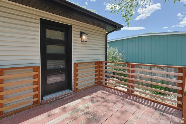 4206 S Whipoorwhil St W, West Valley City, UT 84120 - doorway to property with a deck