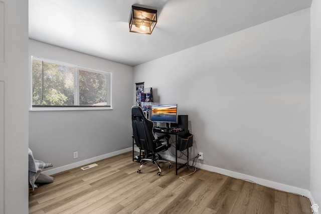 4206 S Whipoorwhil St W, West Valley City, UT 84120 - home office with wood finished floors and baseboards