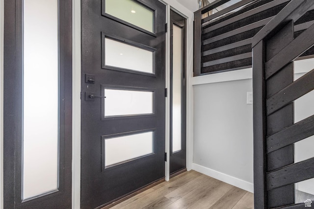 4206 S Whipoorwhil St W, West Valley City, UT 84120 - entrance foyer with light wood-type flooring and baseboards