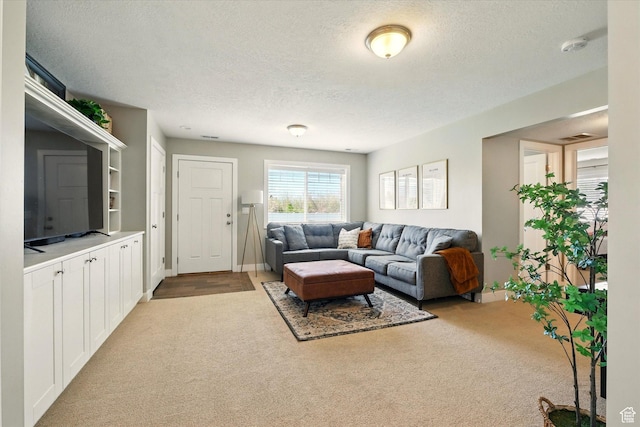 2986 S Stonebridge Dr W, Nibley, UT 84321 - living area featuring light carpet and a textured ceiling
