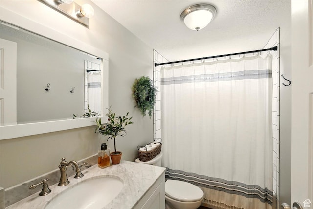 2986 S Stonebridge Dr W, Nibley, UT 84321 - full bathroom featuring vanity, toilet, and curtained shower