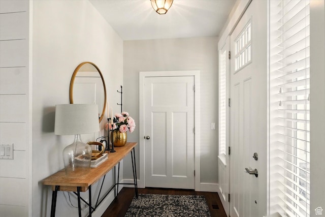 2986 S Stonebridge Dr W, Nibley, UT 84321 - foyer entrance featuring dark wood-type flooring and baseboards