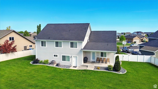 2986 S Stonebridge Dr W, Nibley, UT 84321 - back of property featuring a residential view, a patio, central AC, and roof with shingles