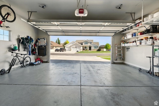 2986 S Stonebridge Dr W, Nibley, UT 84321 - garage featuring a garage door opener