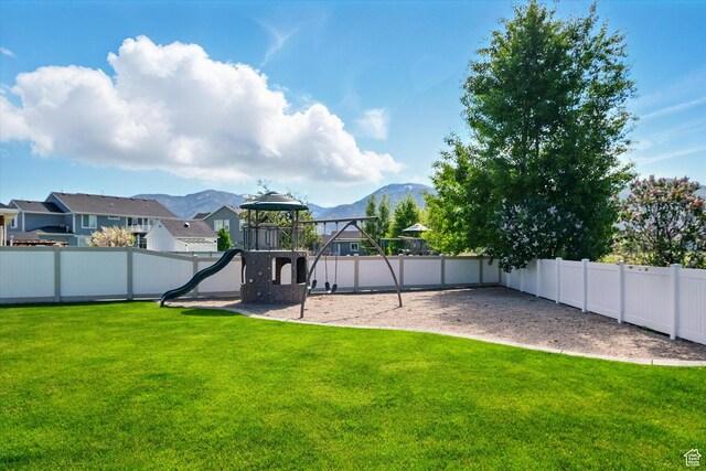 2986 S Stonebridge Dr W, Nibley, UT 84321 - view of yard featuring a playground, a mountain view, and a residential view