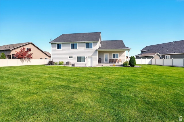 2986 S Stonebridge Dr W, Nibley, UT 84321 - back of property featuring central AC and a patio