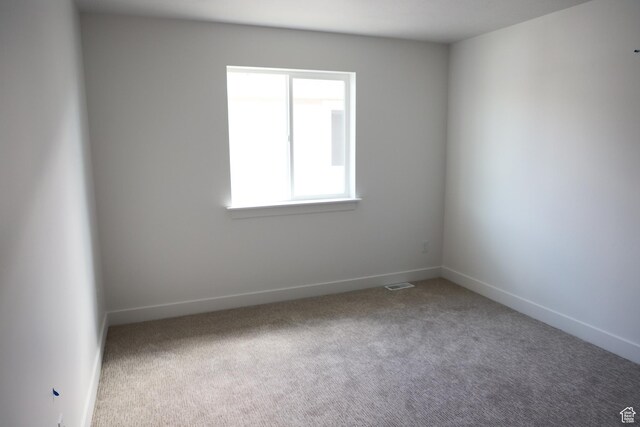3711 N Janie St Unit 1015, Eagle Mountain, UT 84005 - carpeted empty room featuring baseboards