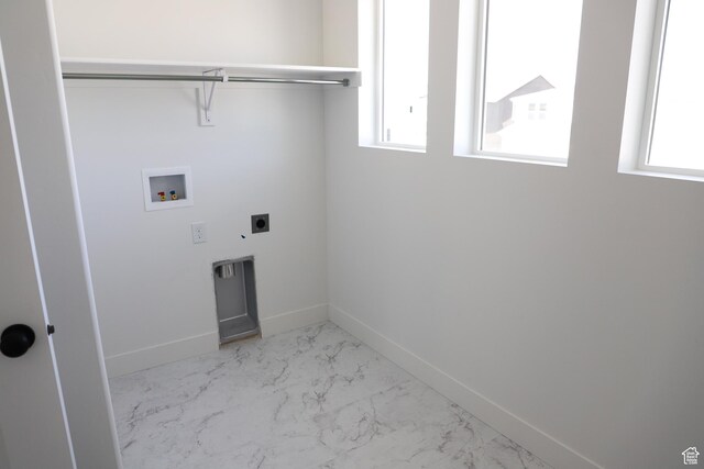 3711 N Janie St Unit 1015, Eagle Mountain, UT 84005 - laundry room with hookup for a washing machine, hookup for an electric dryer, plenty of natural light, and baseboards