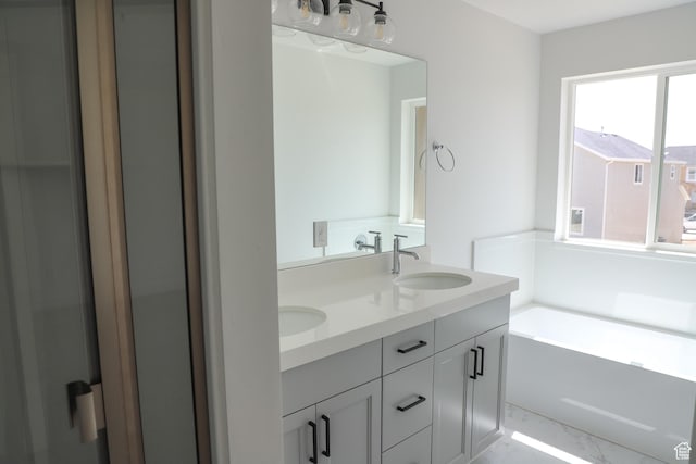 3711 N Janie St Unit 1015, Eagle Mountain, UT 84005 - full bathroom with double vanity and a bath
