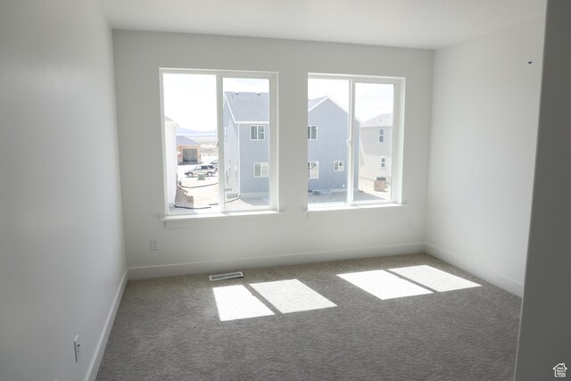 3711 N Janie St Unit 1015, Eagle Mountain, UT 84005 - spare room with carpet and baseboards