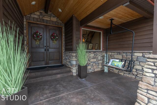 3575 N Foothill Ln, Eden, UT 84310 - property entrance featuring stone siding and french doors