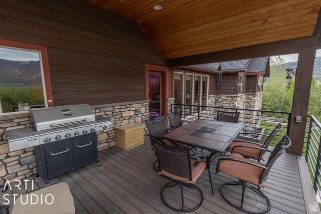 3575 N Foothill Ln, Eden, UT 84310 - wooden deck with grilling area, a mountain view, and outdoor dining area