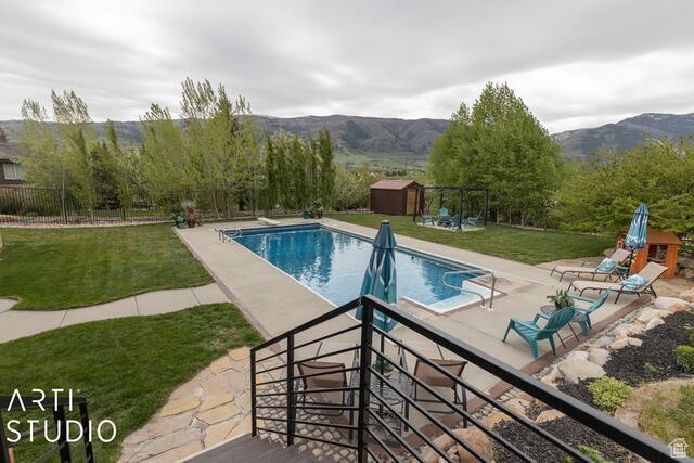 3575 N Foothill Ln, Eden, UT 84310 - view of pool with a patio and a mountain view