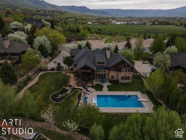 3575 N Foothill Ln, Eden, UT 84310 - aerial view of property and surrounding area with a pool area and mountains