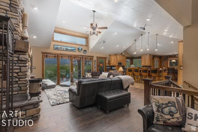 3575 N Foothill Ln, Eden, UT 84310 - living area with a ceiling fan, lofted ceiling, wood finished floors, and a fireplace