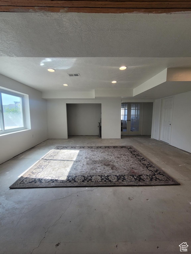 2981 S Pika Dr, West Valley City, UT 84128 - spare room with recessed lighting, concrete floors, and a textured ceiling