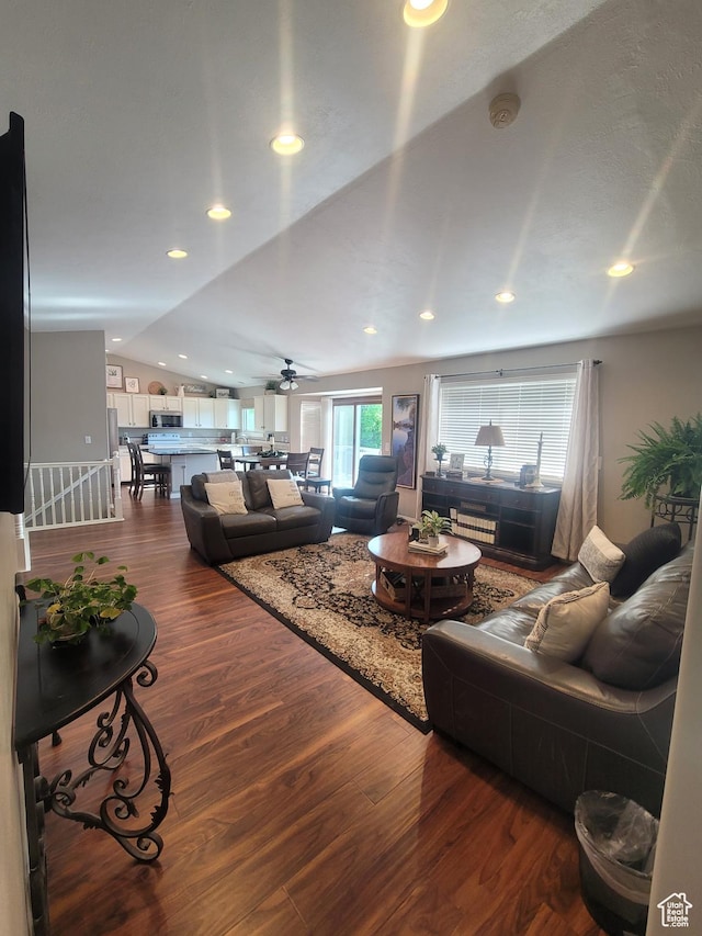 2981 S Pika Dr, West Valley City, UT 84128 - living room featuring dark wood finished floors, vaulted ceiling, a ceiling fan, and recessed lighting