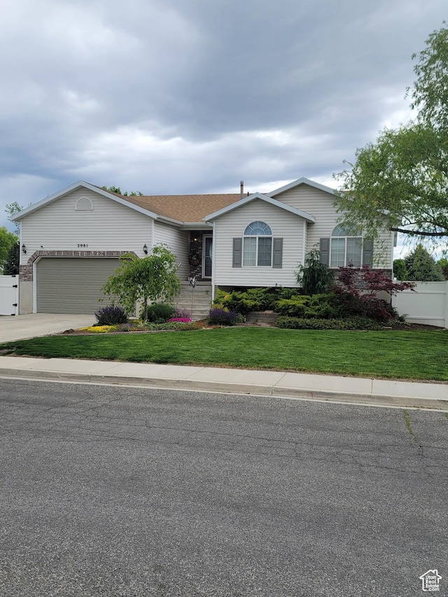2981 S Pika Dr, West Valley City, UT 84128 - single story home with a garage and concrete driveway
