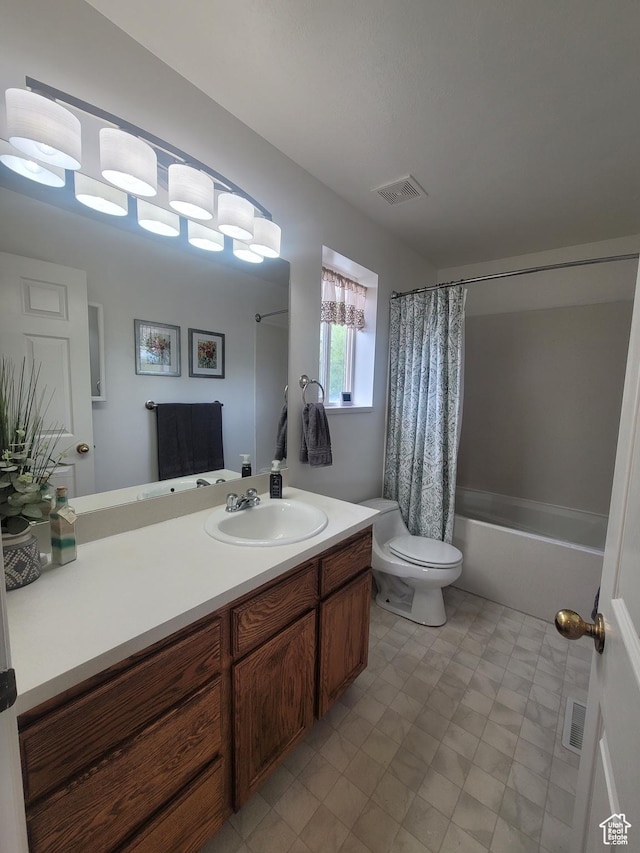 2981 S Pika Dr, West Valley City, UT 84128 - full bath featuring vanity, toilet, and shower / bath combination with curtain
