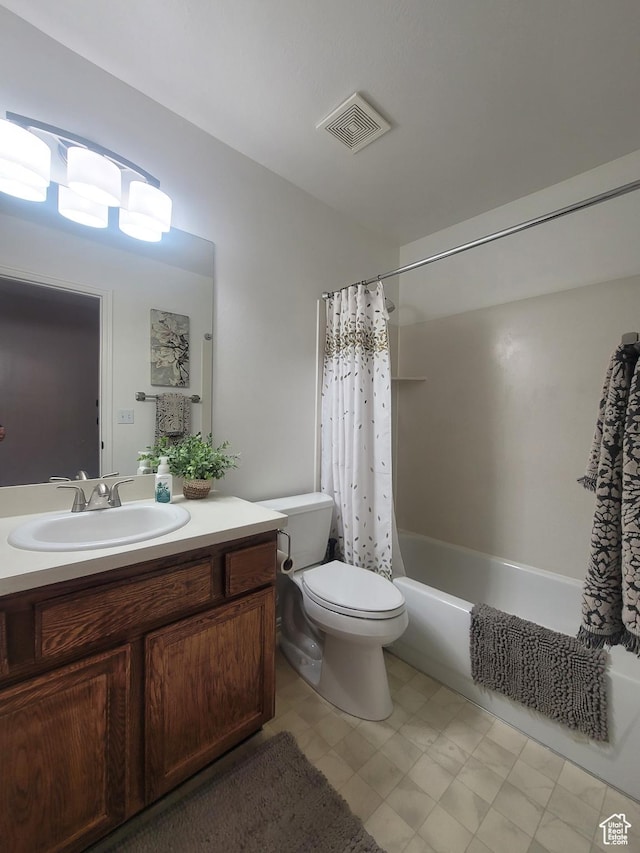 2981 S Pika Dr, West Valley City, UT 84128 - full bathroom with vanity, toilet, and shower / bath combination with curtain