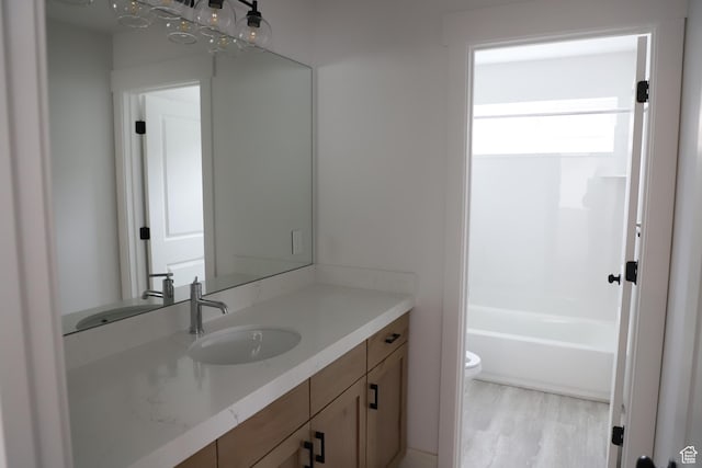 3736 N Janie St Unit 1005, Eagle Mountain, UT 84005 - full bathroom with toilet, vanity, wood finished floors, and shower / bathtub combination