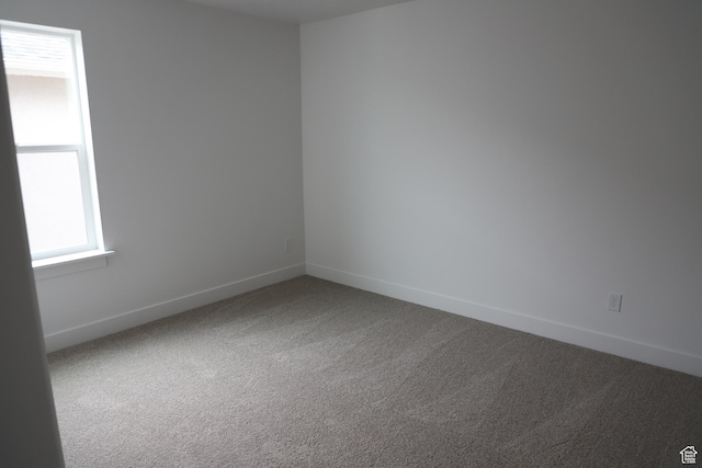 3736 N Janie St Unit 1005, Eagle Mountain, UT 84005 - carpeted spare room featuring baseboards