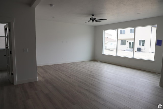 3736 N Janie St Unit 1005, Eagle Mountain, UT 84005 - unfurnished room with ceiling fan, wood finished floors, and baseboards