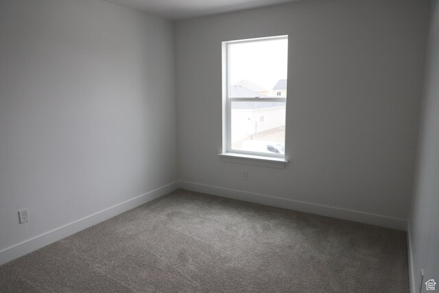 3736 N Janie St Unit 1005, Eagle Mountain, UT 84005 - unfurnished room with carpet floors and baseboards