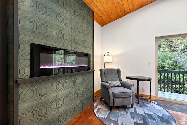 5548 E Emigration Canyon Rd E, Salt Lake City, UT 84108 - sitting room featuring vaulted ceiling and baseboards