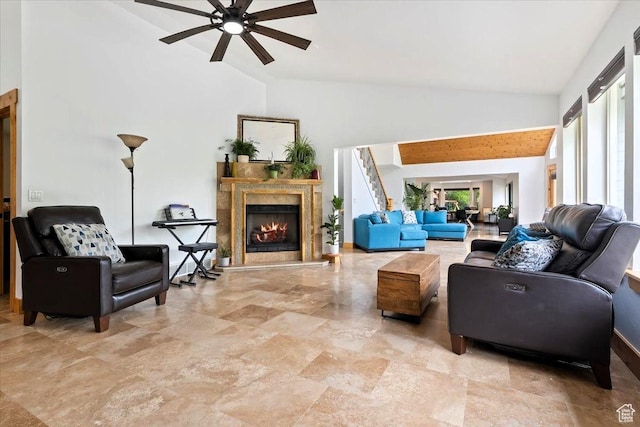 5548 E Emigration Canyon Rd E, Salt Lake City, UT 84108 - living room featuring ceiling fan, high vaulted ceiling, and a high end fireplace