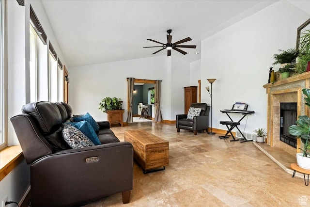 5548 E Emigration Canyon Rd E, Salt Lake City, UT 84108 - living area with a ceiling fan, healthy amount of natural light, a high end fireplace, and high vaulted ceiling