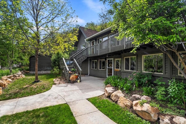 5548 E Emigration Canyon Rd E, Salt Lake City, UT 84108 - view of front of home featuring a deck, stairs, and a patio