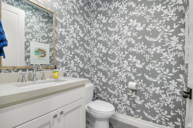 567 W Cascade Meadows Loop S, Midway, UT 84049 - bathroom with wallpapered walls, toilet, vanity, tile patterned flooring, and baseboards