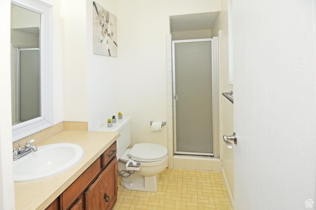 1185 W 725 N, Clearfield, UT 84015 - bathroom featuring vanity, a stall shower, and toilet