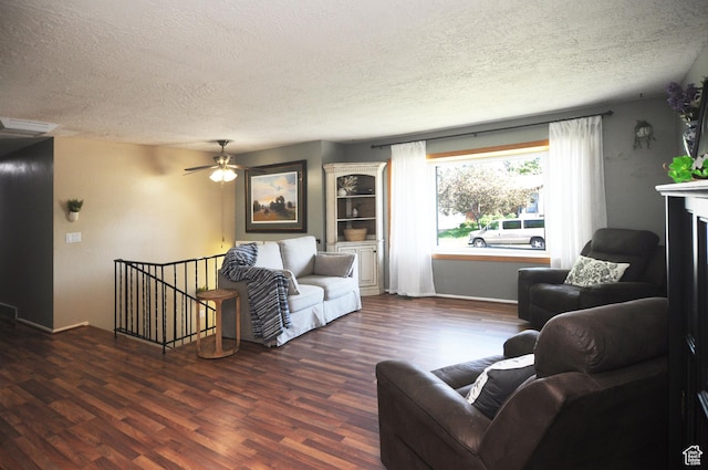 1185 W 725 N, Clearfield, UT 84015 - living area with a textured ceiling, wood finished floors, ceiling fan, and baseboards
