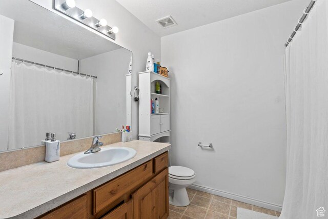 2856 W 3965 S Unit 78, West Haven, UT 84401 - bathroom with vanity, toilet, baseboards, and a shower with curtain