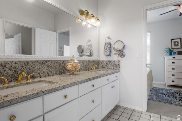 2016 E Graystone Ln S, Draper, UT 84020 - bathroom with double vanity, tile patterned floors, and baseboards